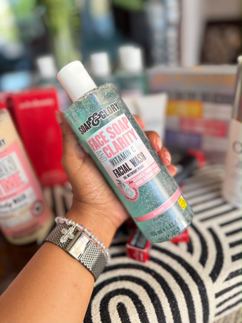 Soap & Glory Face Soap and Clarity vitamin C facial wash held in hand